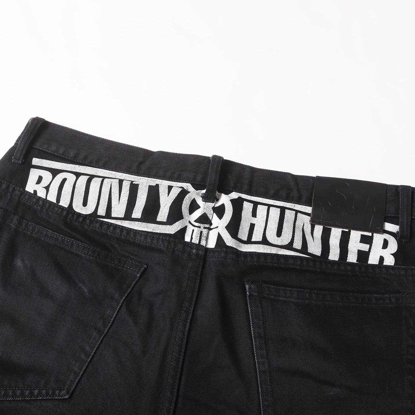 23AW ×BOUNTY HUNTER ロゴプリント デニムパンツ(Regular Jean)