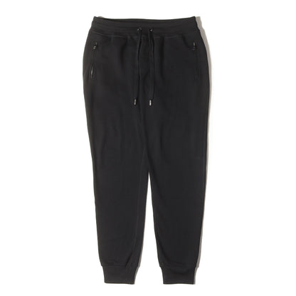 23AW ロゴプレート付き テーパード スウェットパンツ