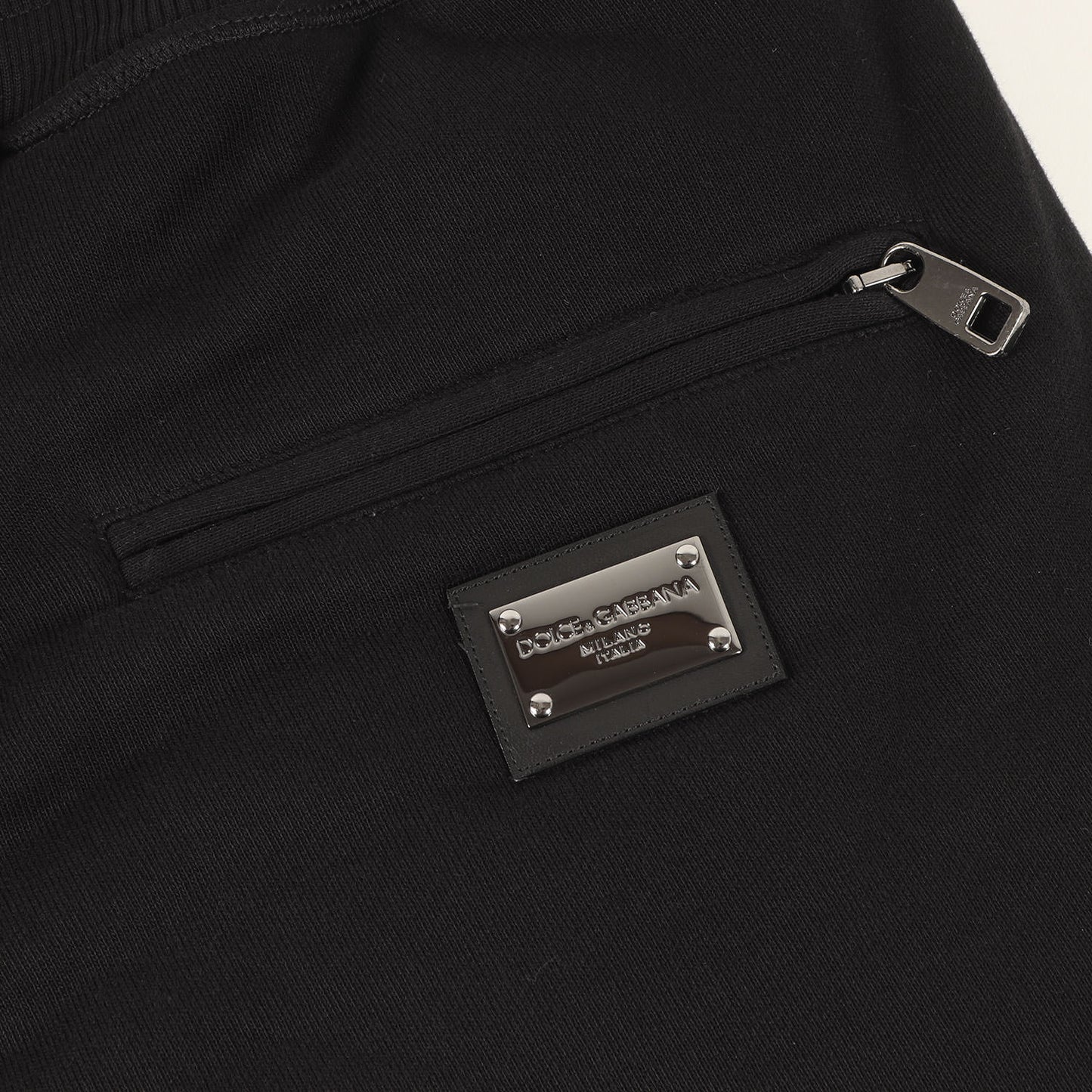 23AW ロゴプレート付き テーパード スウェットパンツ