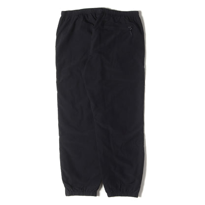 アーチロゴ ナイロン トラックパンツ(Corner Arc Track Pant)