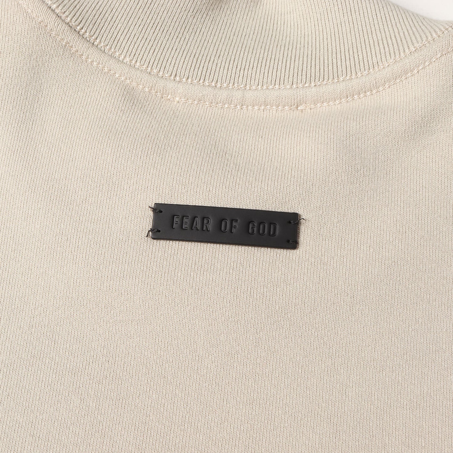 ETERNALフェルトロゴ モックネック オーバーサイズ スウェット