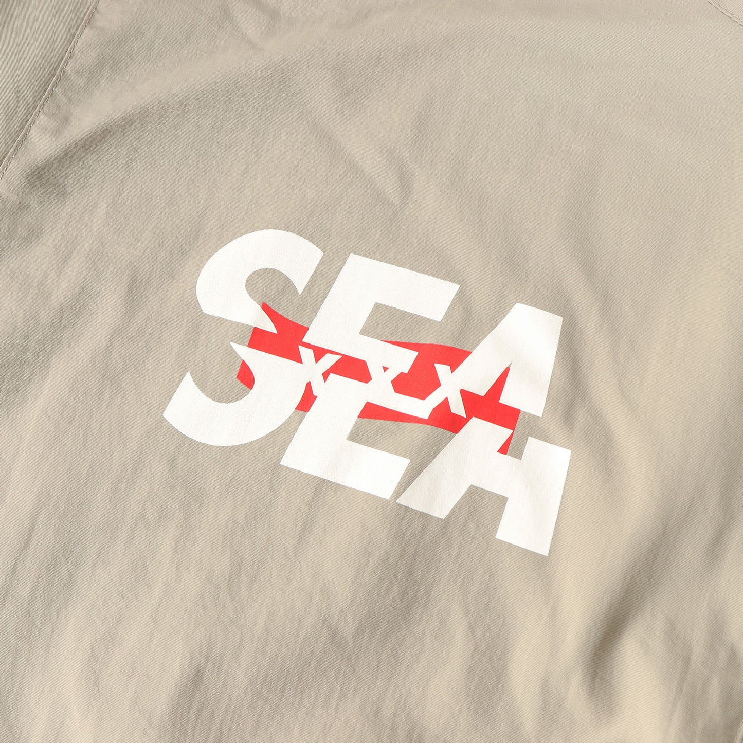 ×GOD SELECTION XXX コラボロゴ ナイロン フルジップ フーデッド ジャケット (NYLON PARKA)