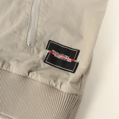 ×GOD SELECTION XXX コラボロゴ ナイロン フルジップ フーデッド ジャケット (NYLON PARKA)