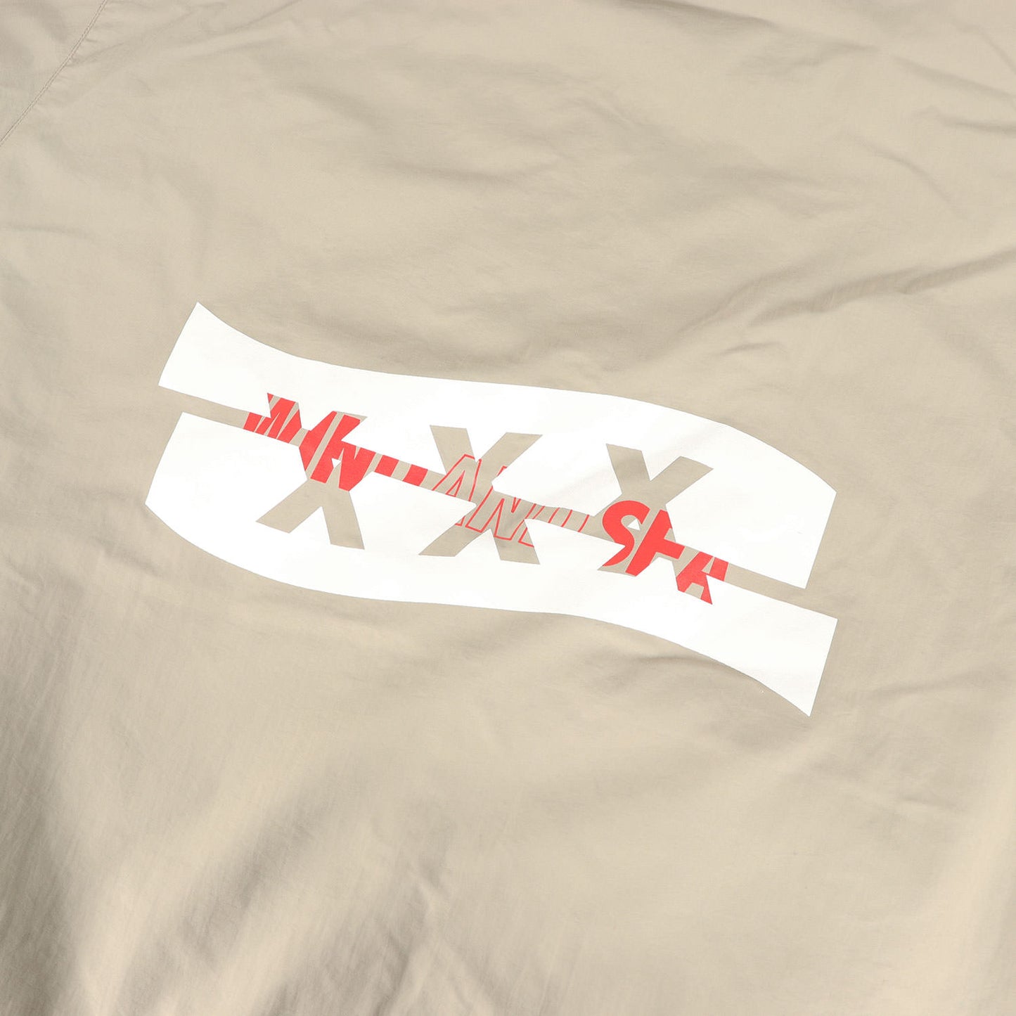 ×GOD SELECTION XXX コラボロゴ ナイロン フルジップ フーデッド ジャケット (NYLON PARKA)