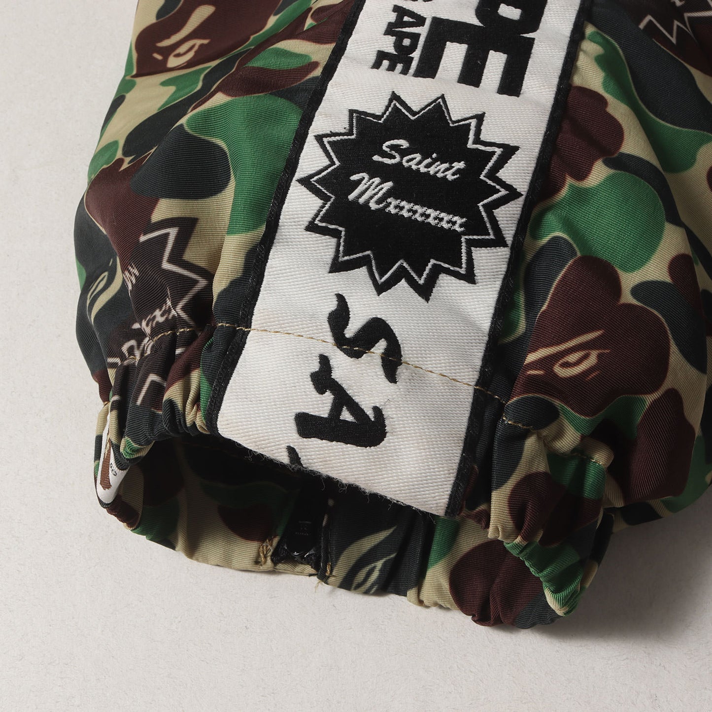 24SS ×A BATHING APE 30周年記念 猿迷彩 ナイロン トラック パンツ (AP_TRACK PNT/ST APE/CAMO)