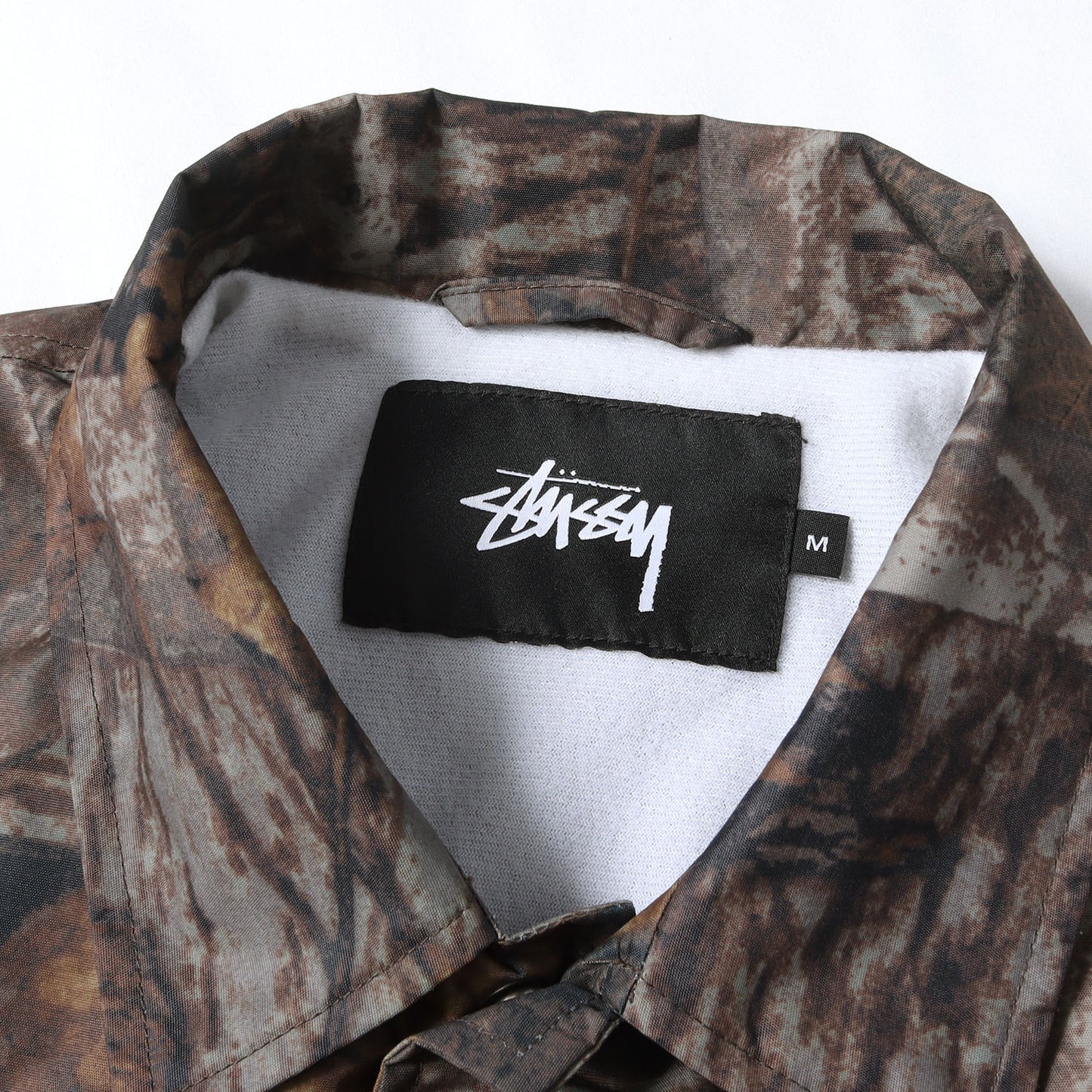 ワールドツアー プリント リアルツリーカモ コーチジャケット (World Tour Coach Jacket)