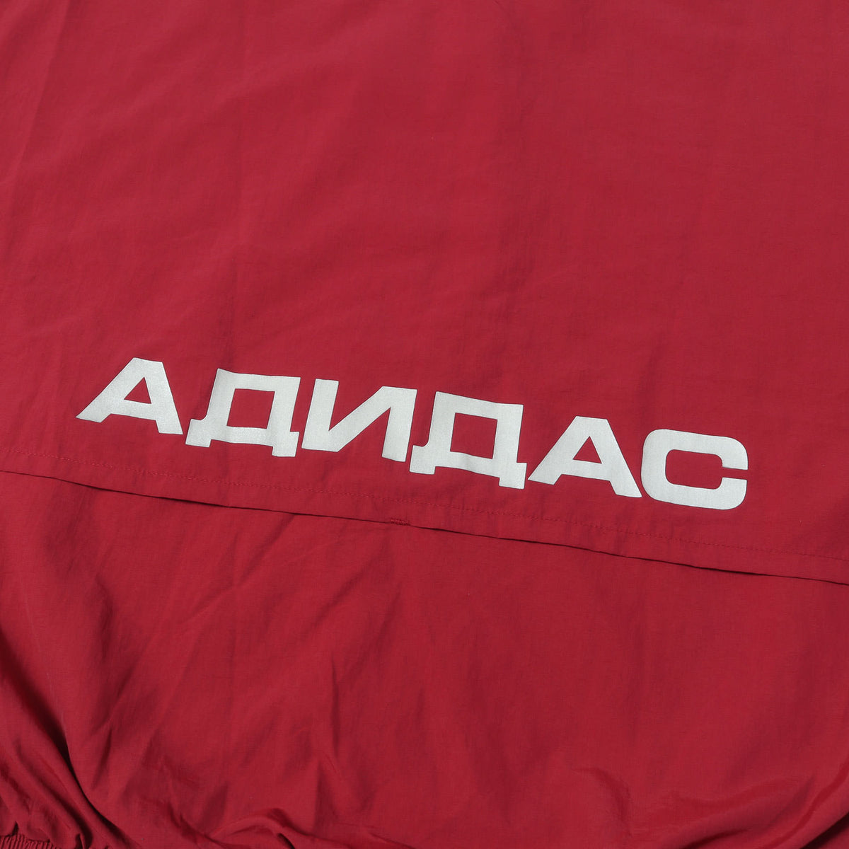 ×adidas オーバーサイズ ナイロン トラックジャケット