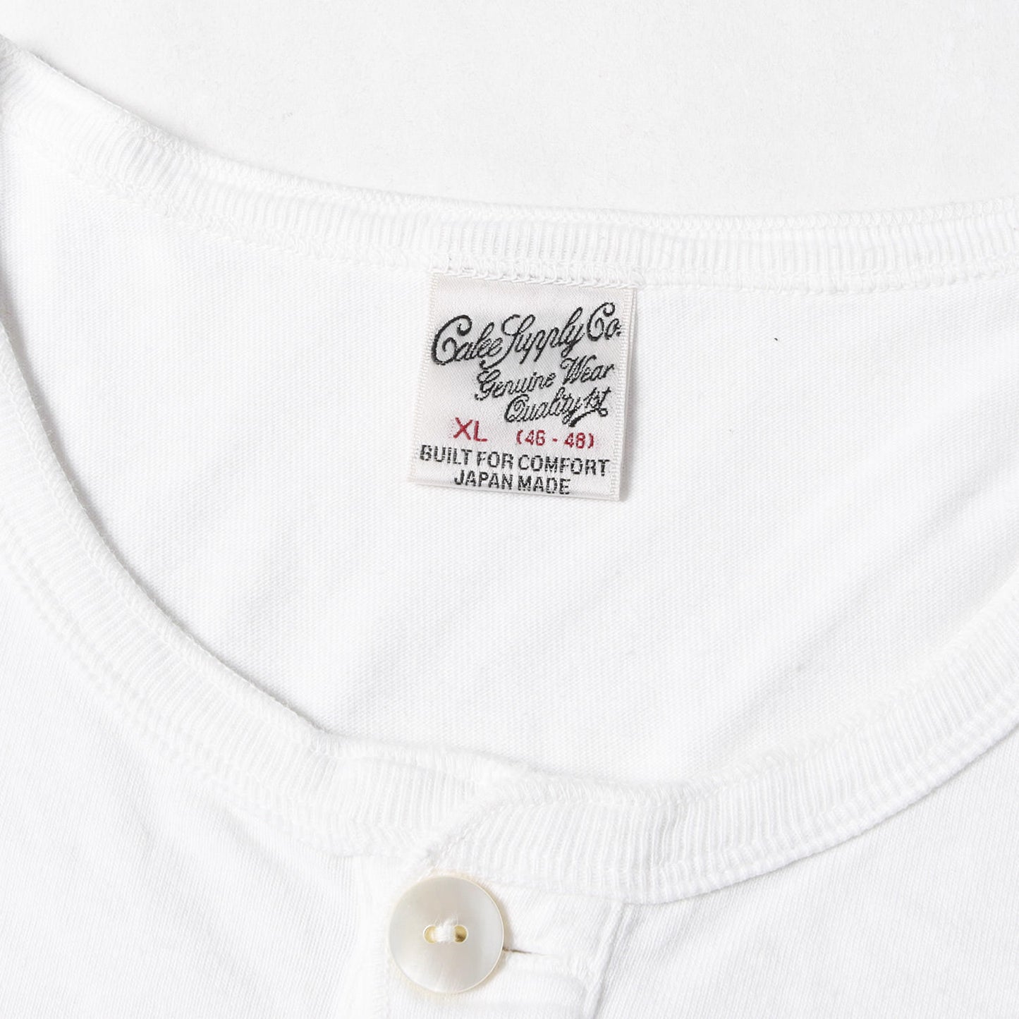 裾ロゴ ヘンリーネック Tシャツ