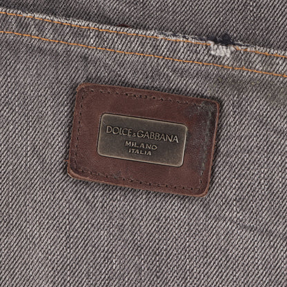 ダメージ加工 ロゴプレート付き ローライズ テーパード デニムパンツ / ジーンズ 14GOLD