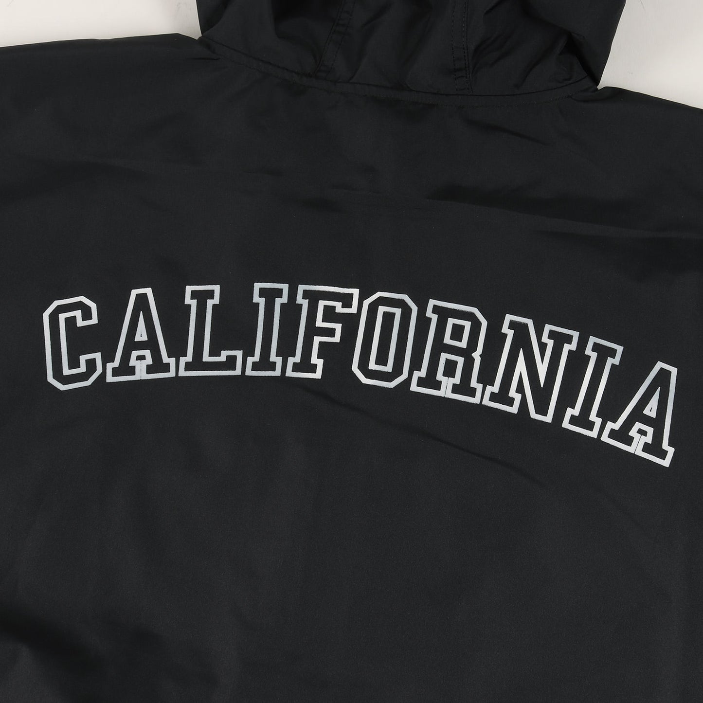 24AW × Champion ロゴ プリント アノラック パーカー (Packable Anorak)
