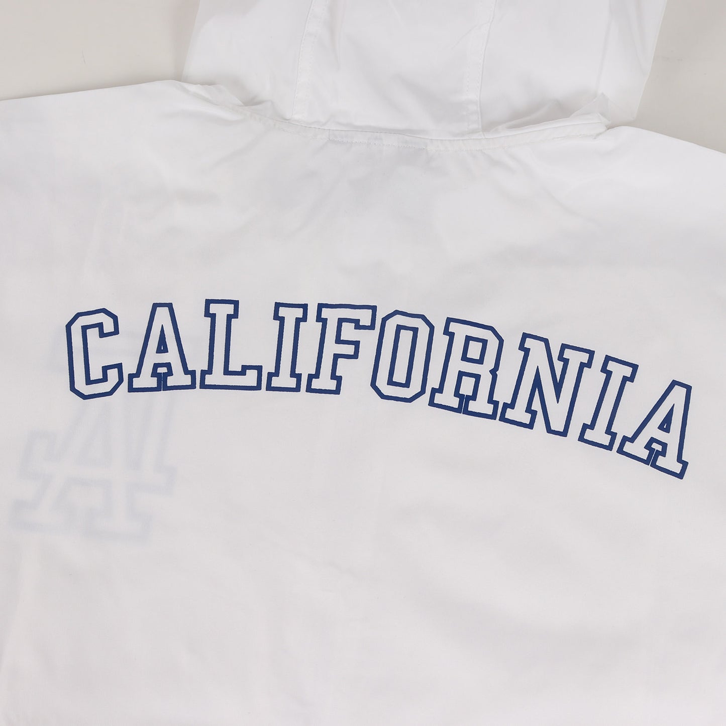24AW × Champion ロゴ プリント アノラック パーカー (Packable Anorak)