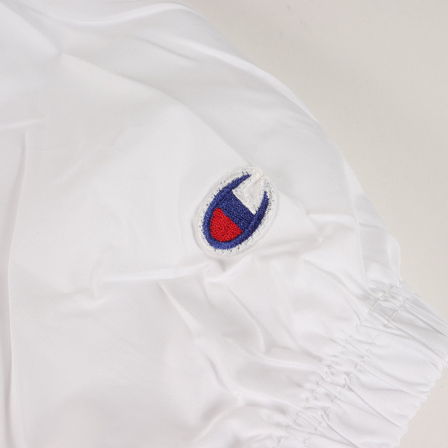 24AW × Champion ロゴ プリント アノラック パーカー (Packable Anorak)