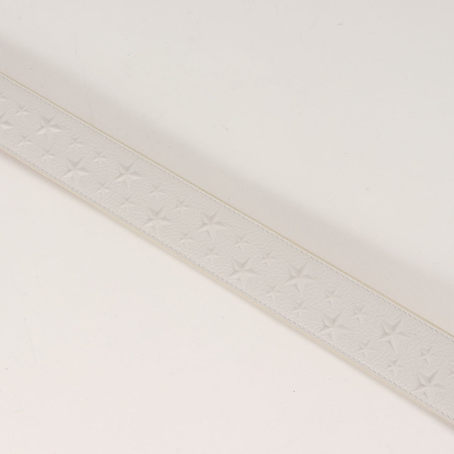 スタースタッズ エンボス グレイニー レザー ベルト (ARCHER EMBOSSED STARS ON GRAINY LEATHER 141ARCHER.EMG)