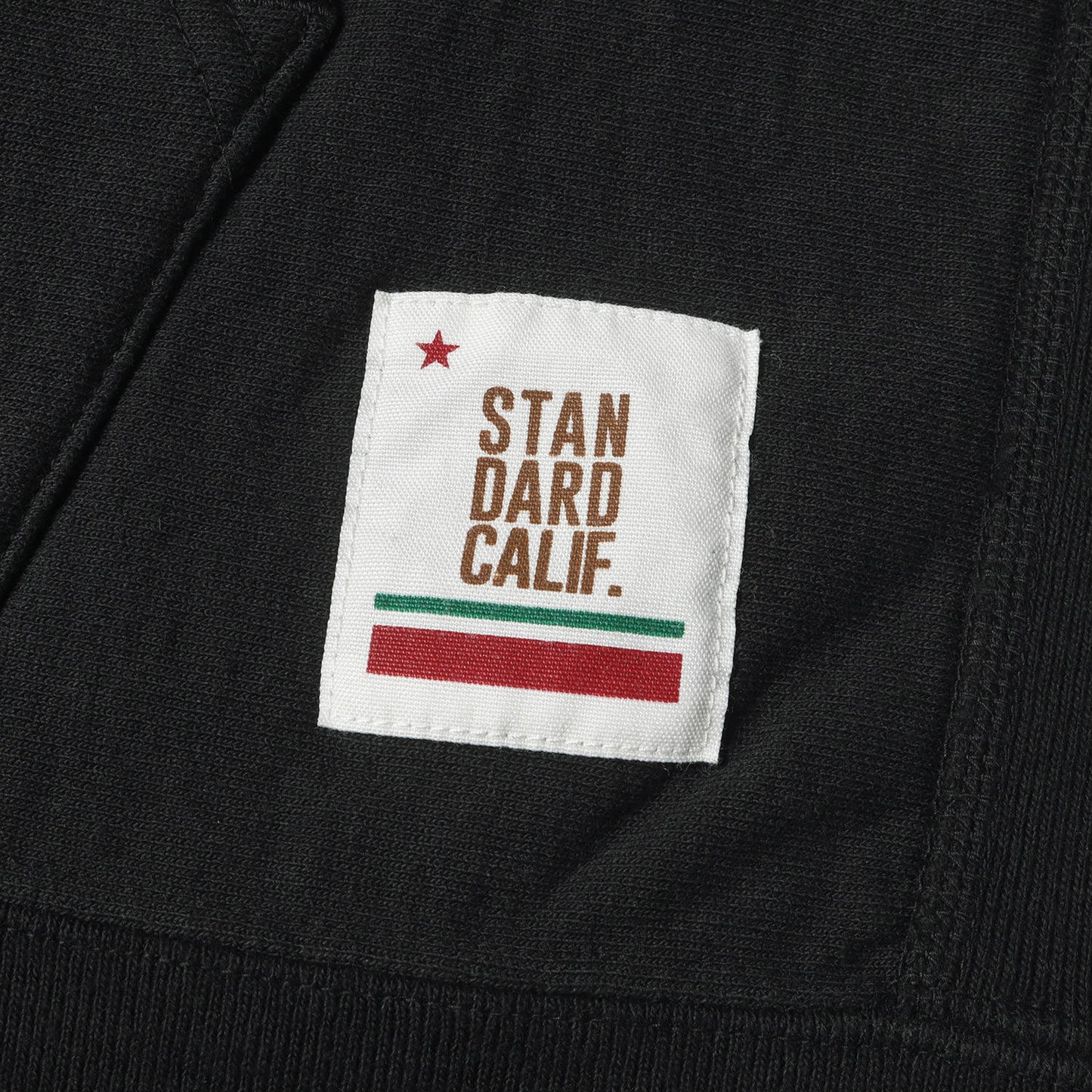 パロディ プリント スウェット パーカー (HEAVYWEIGHT H.R.C LOGO HOOD SWEAT)