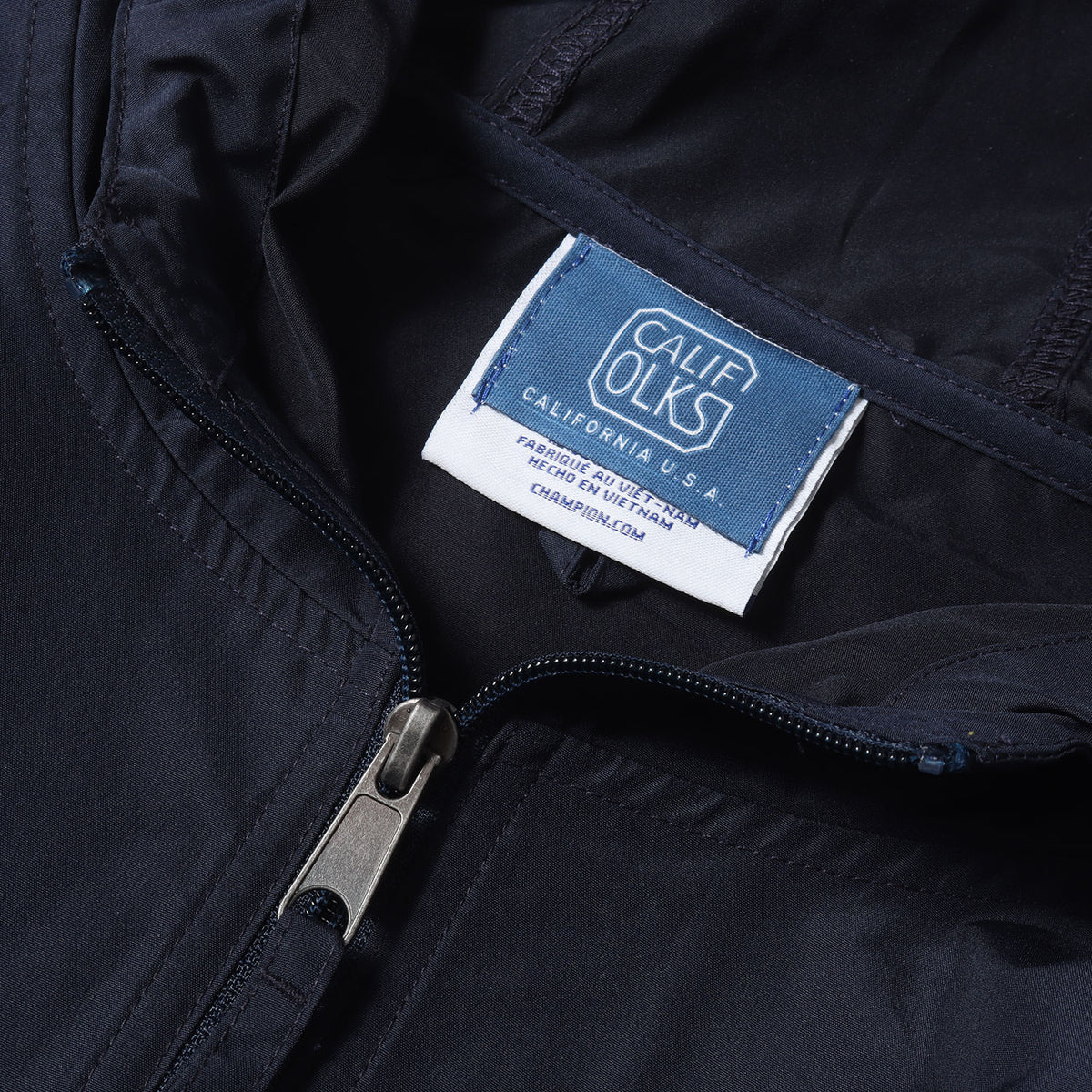 24AW × Champion ロゴ プリント アノラック パーカー (Packable Anorak)