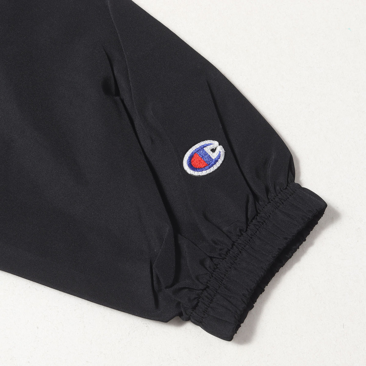 24AW × Champion ロゴ プリント アノラック パーカー (Packable Anorak)
