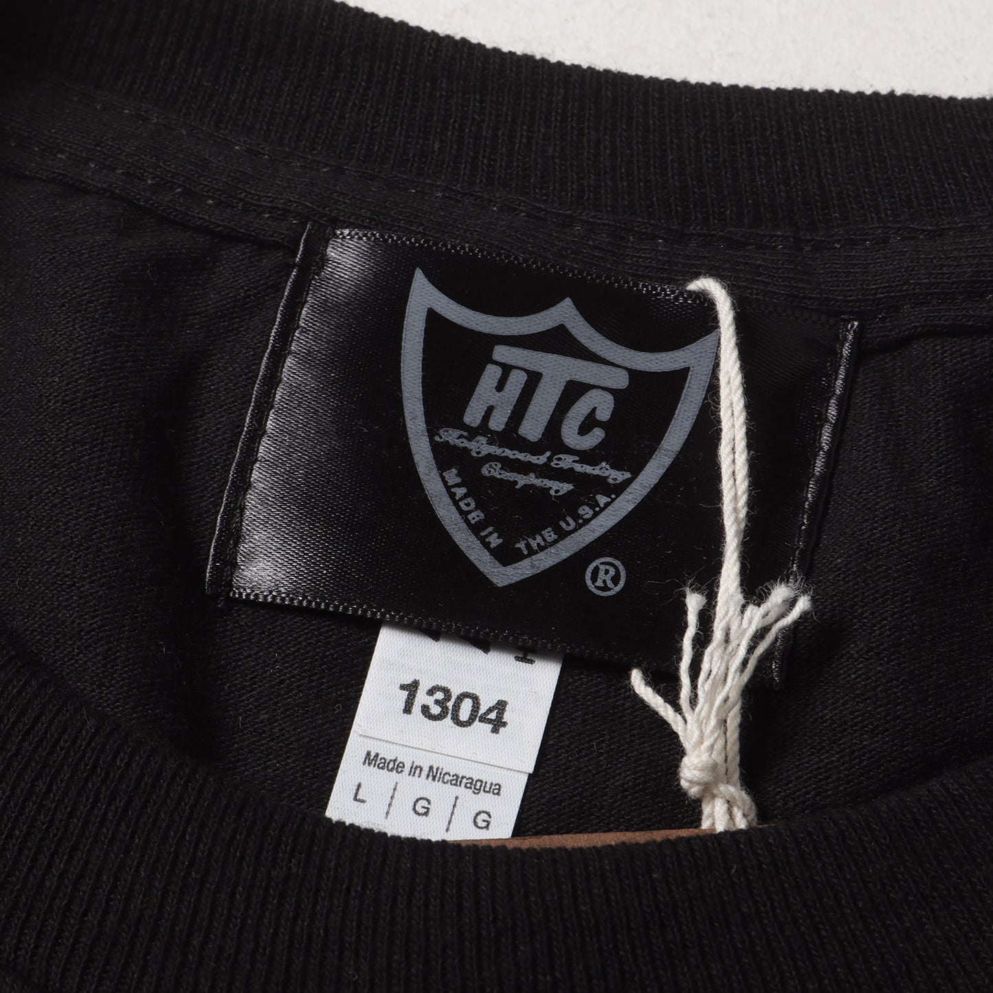 24AW × HTC スタッズ シールドロゴ ロングスリーブ Tシャツ (HTC × SD LOGO LS T)