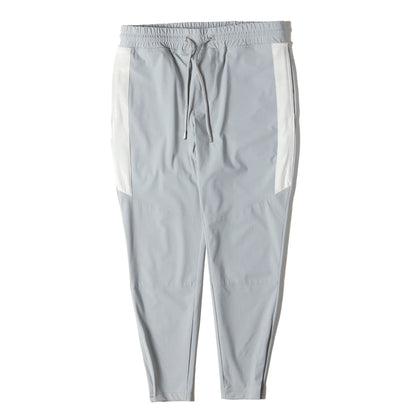 23SS サイドベロアライン 裾ジップ ストレッチ アイスナイロン イージー パンツ (TM ICE NYLON BIKER SKINNY P312 NLU031)