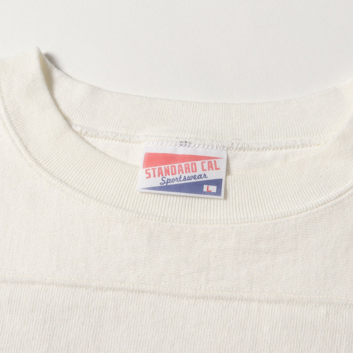 ロゴ ヘビーウェイト フットボール ロングスリーブ Tシャツ (SD HEAVYWEIGHT FOOTBALL LONG SLEEVE T-SHIRT)
