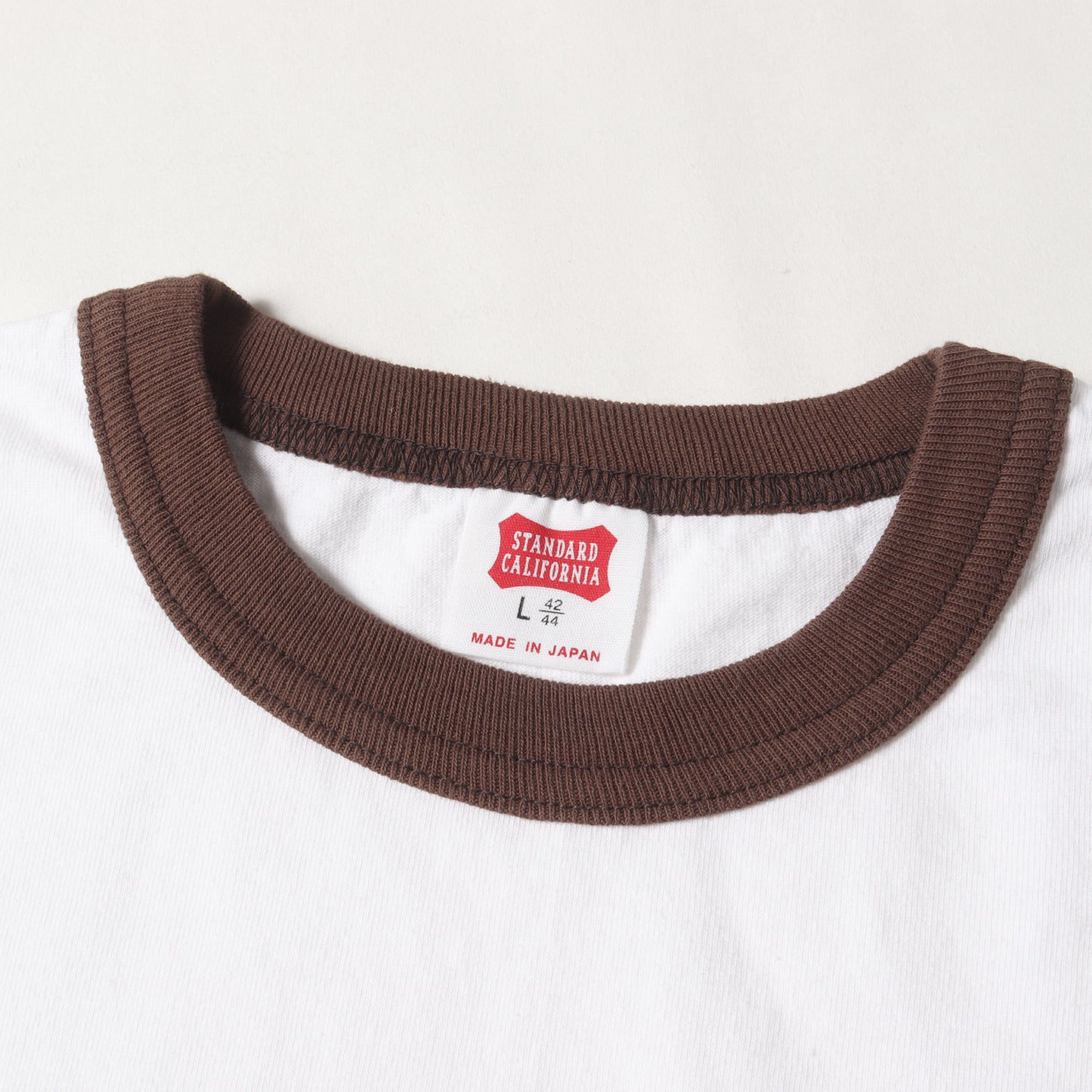 25SS グラフィック ロゴ リンガーネック ロングスリーブ Tシャツ (SD US Cotton Script Logo Ringer Long Sleeve T)