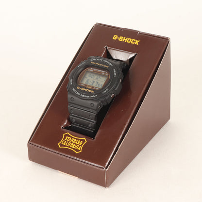 23AW × CASIO 20周年記念 腕時計 (G-SHOCK × SD DW-5750E-1JF)