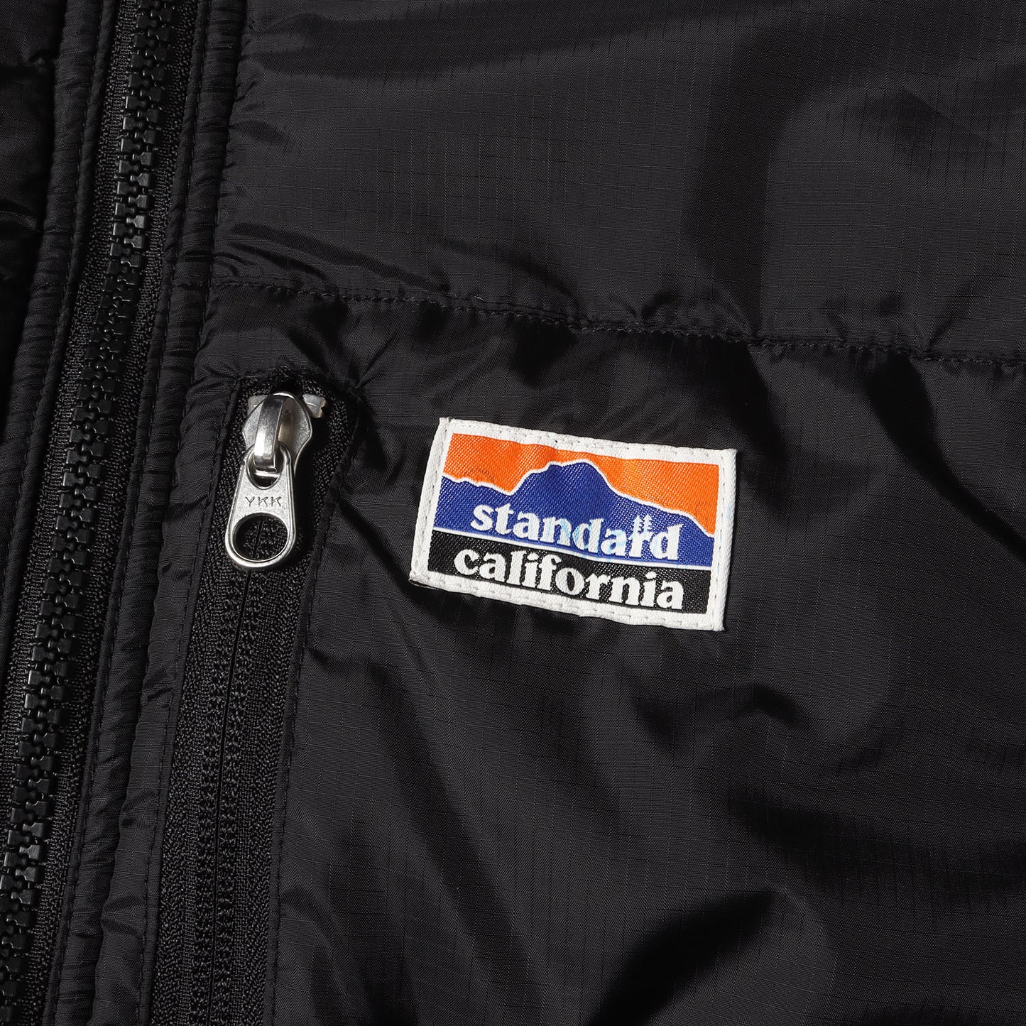 リバーシブル フーデッド パテッド ジャケット (SD Reversible Puff Jacket)