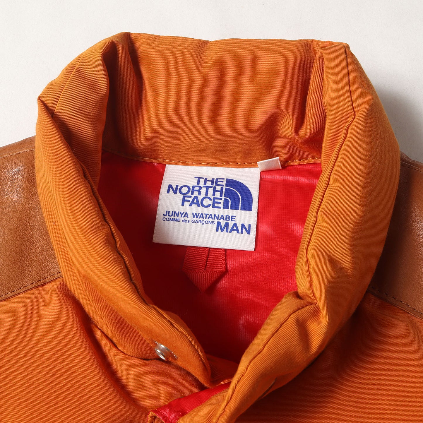 × THE NORTH FACE 60/40クロス シンチバック付き レザーヨーク ダウンベスト (WD-V101)