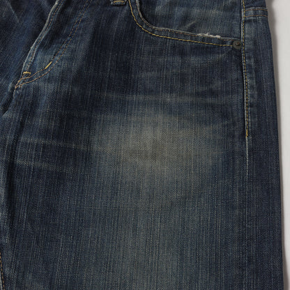 スタッズ付き ストレッチ デニムパンツ