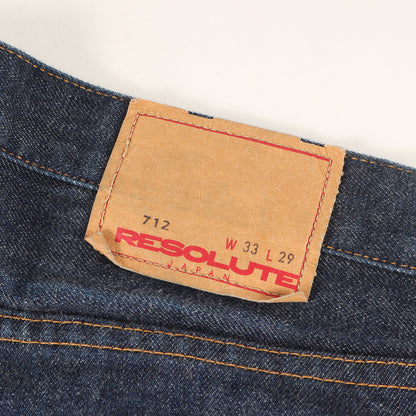 712 テーパード デニムパンツ