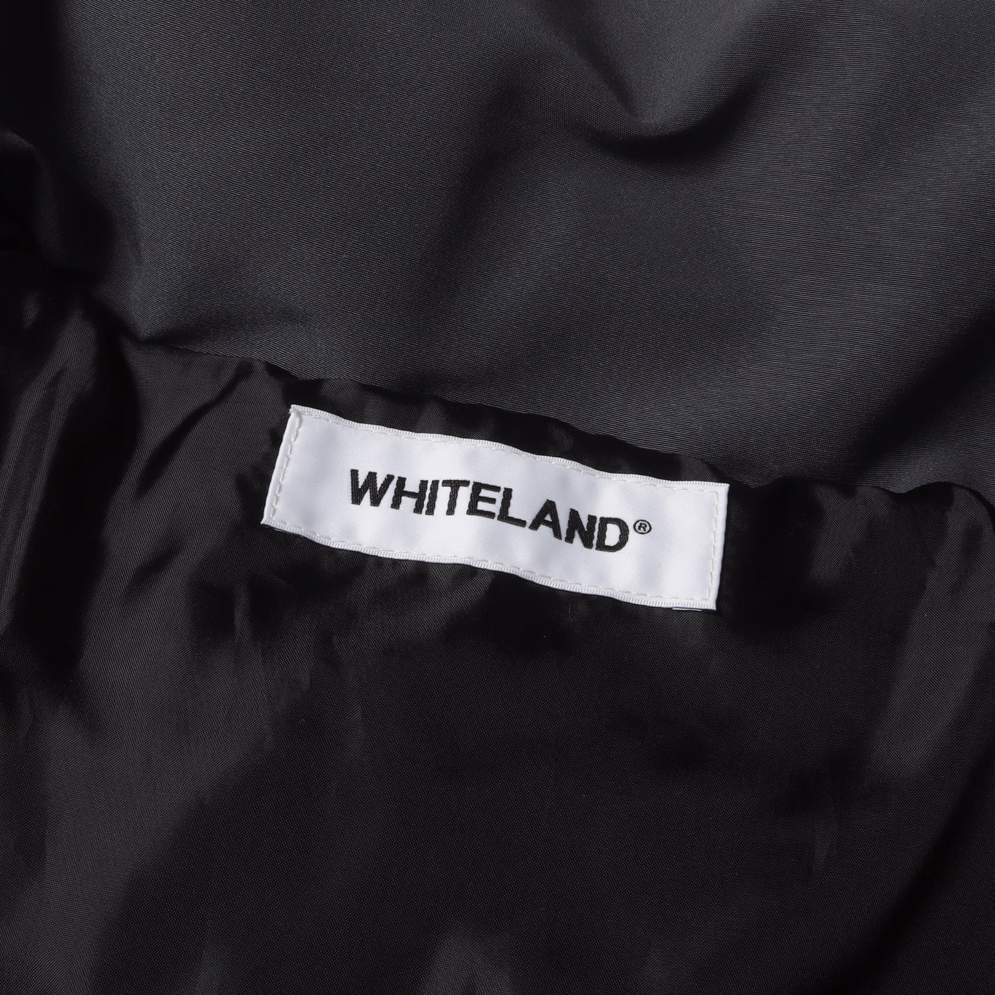 24AW トライバルモチーフ ハイネック パテッド ブルゾン