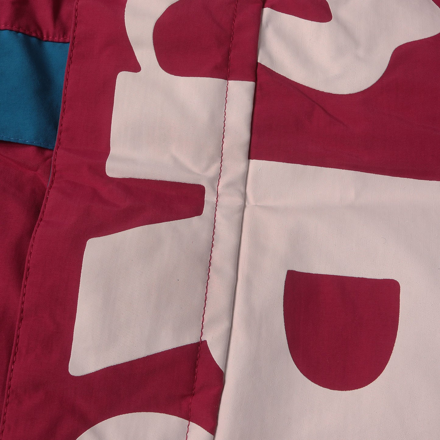 ロゴ クレイジーパターン ナイロン フーディー ジャケット