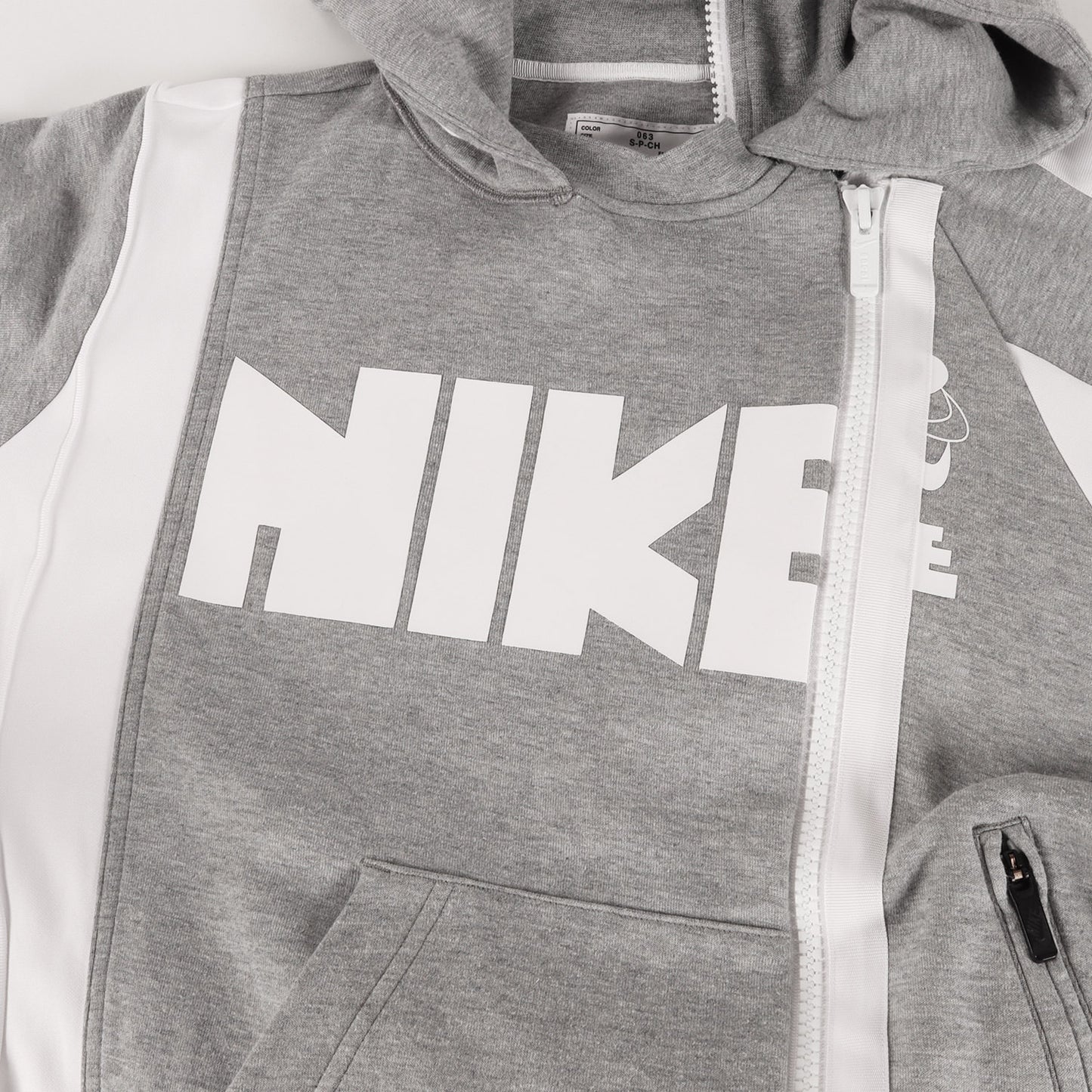 × NIKE 再構築 スウェット ダブルジップ パーカー