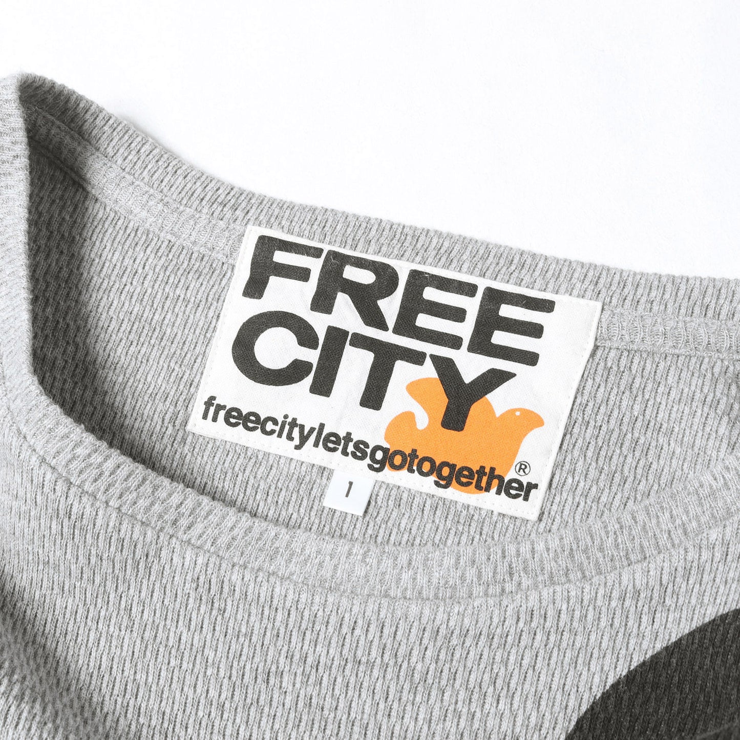 23AW グラフィック ロゴ サーマル 長袖 Tシャツ (FREECITY SIGN THERMAL LONG SLEEVE T)