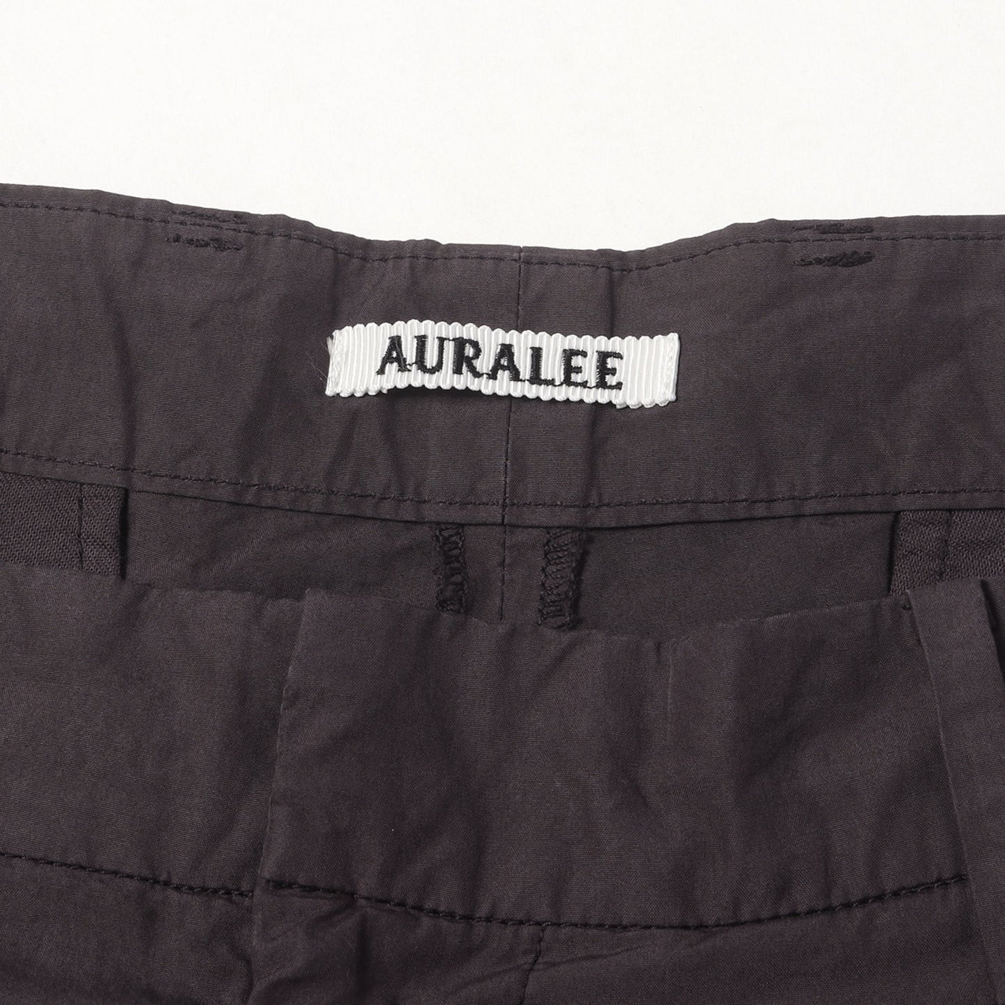 26SS ガーメントダイ加工 スラックスパンツ (GARMENT-DYED FINX SHUTTLE WEATHER ONE-TUCK SLACKS)