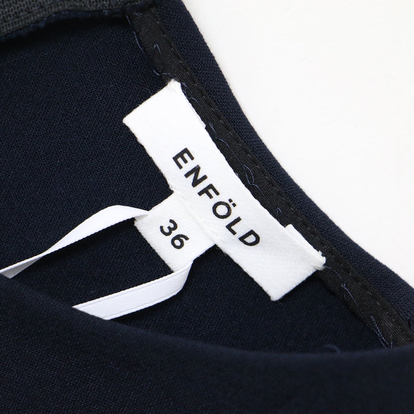 ダブルクロス ランダムヘム チュニック / ブラウス クルーネック 長袖 アシンメトリー