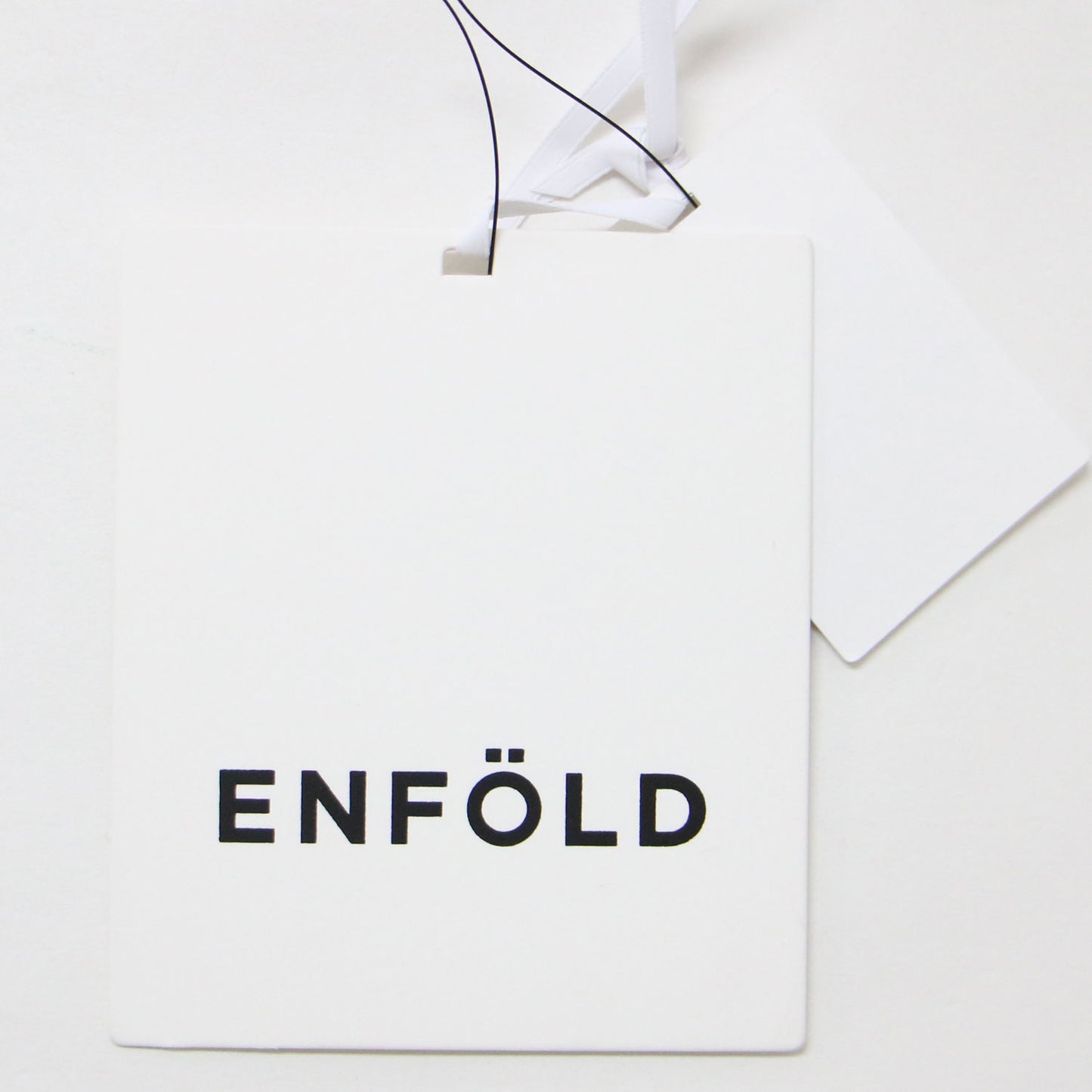 ダブルクロス ランダムヘム チュニック / ブラウス クルーネック 長袖 アシンメトリー