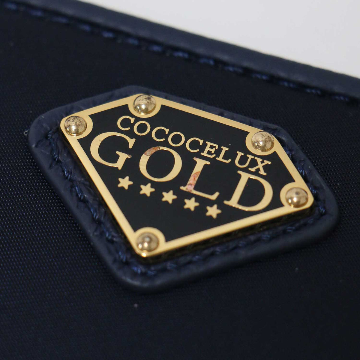 GOLD POCONO NYLON ラウンドファスナー ウォレット / 長財布 メタルロゴ ナイロン
