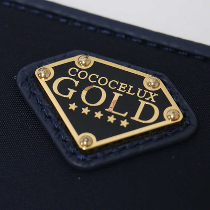GOLD POCONO NYLON ラウンドファスナー ウォレット / 長財布 メタルロゴ ナイロン