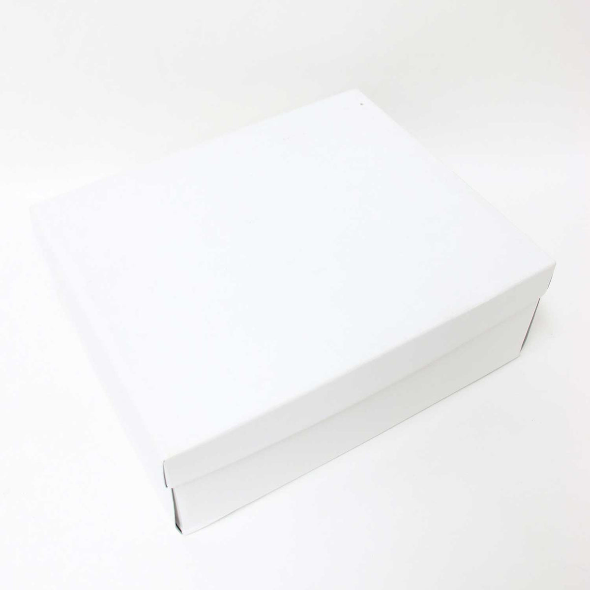 GRISE 6cm レザー オブリークフィット ショート ブーツ / 太ヒール パイソン柄 型押し