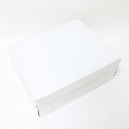 GRISE 6cm レザー オブリークフィット ショート ブーツ / 太ヒール パイソン柄 型押し
