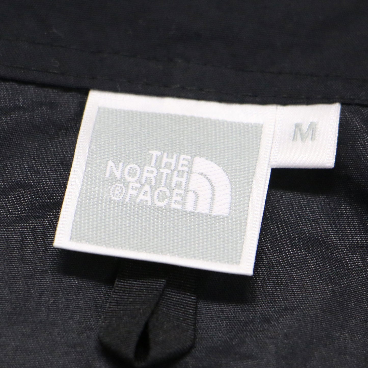 コンパクトジャケット NPW72230 / ブルゾン フード付き ポケッタブル はっ水加工 ナイロン