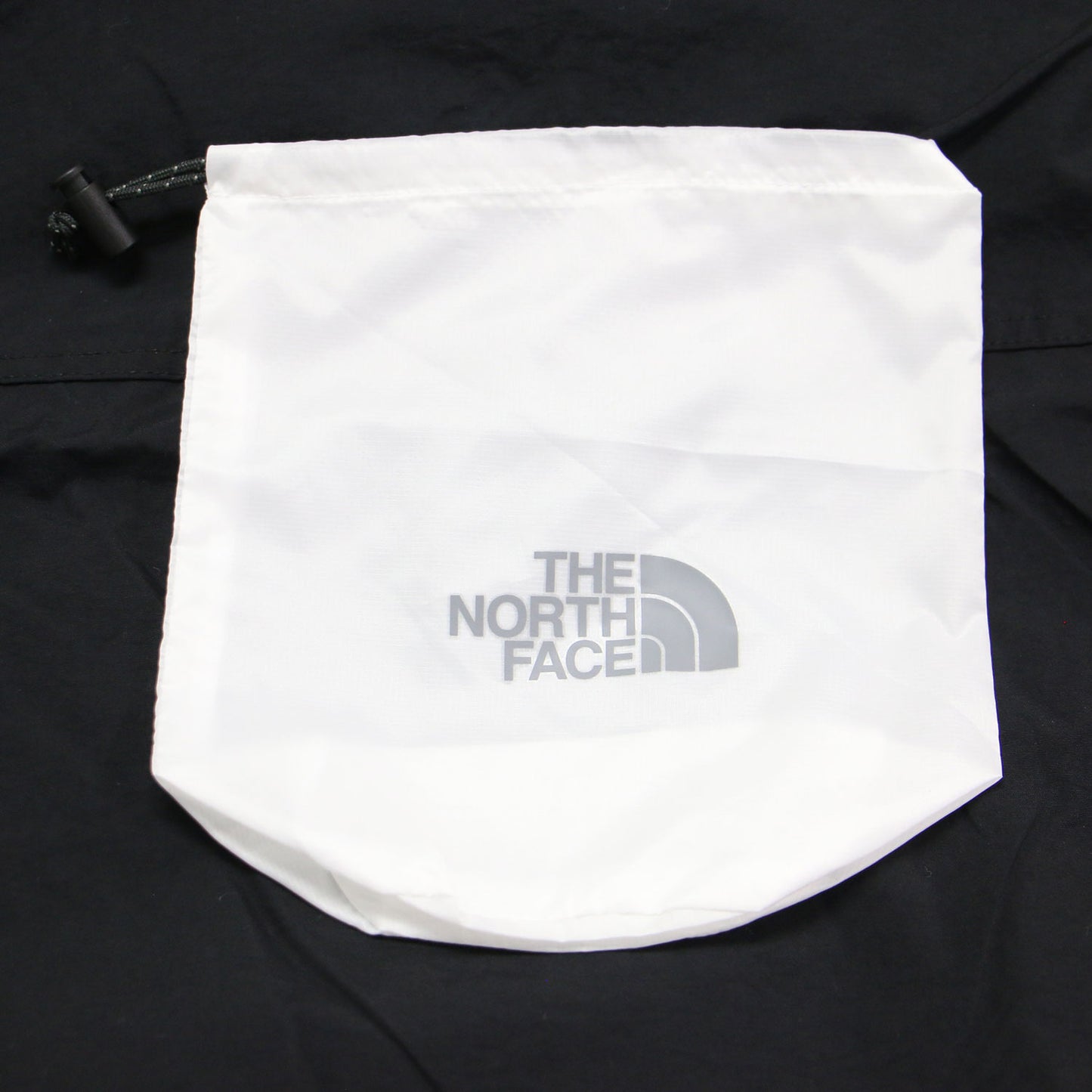 コンパクトジャケット NPW72230 / ブルゾン フード付き ポケッタブル はっ水加工 ナイロン