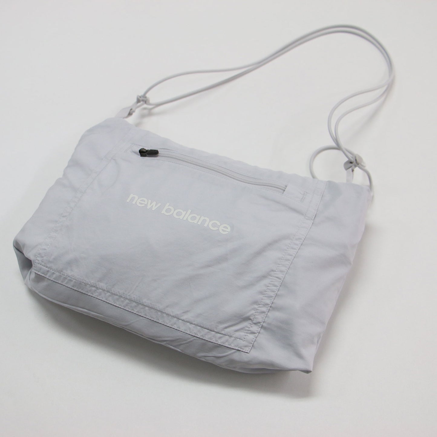 25春夏 アスレティックス パッカブルジャケット / Athletics ブルゾン 長袖 ドロップショルダー スタンドカラー 撥水 ポケッタブル オーバーサイズ ナイロン