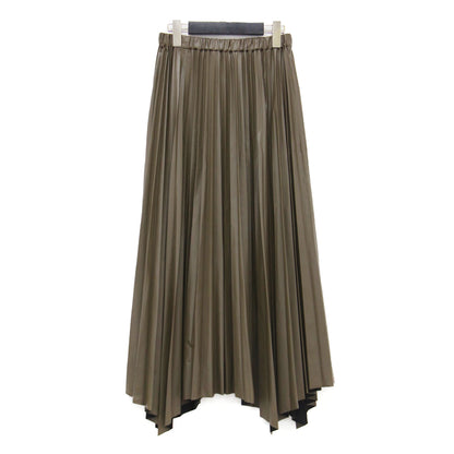 24秋冬 シンセティックレザー プリーツスカート / SYNTHETIC LEATHER PLEATS SKIRT ロング丈 ランダムヘムライン