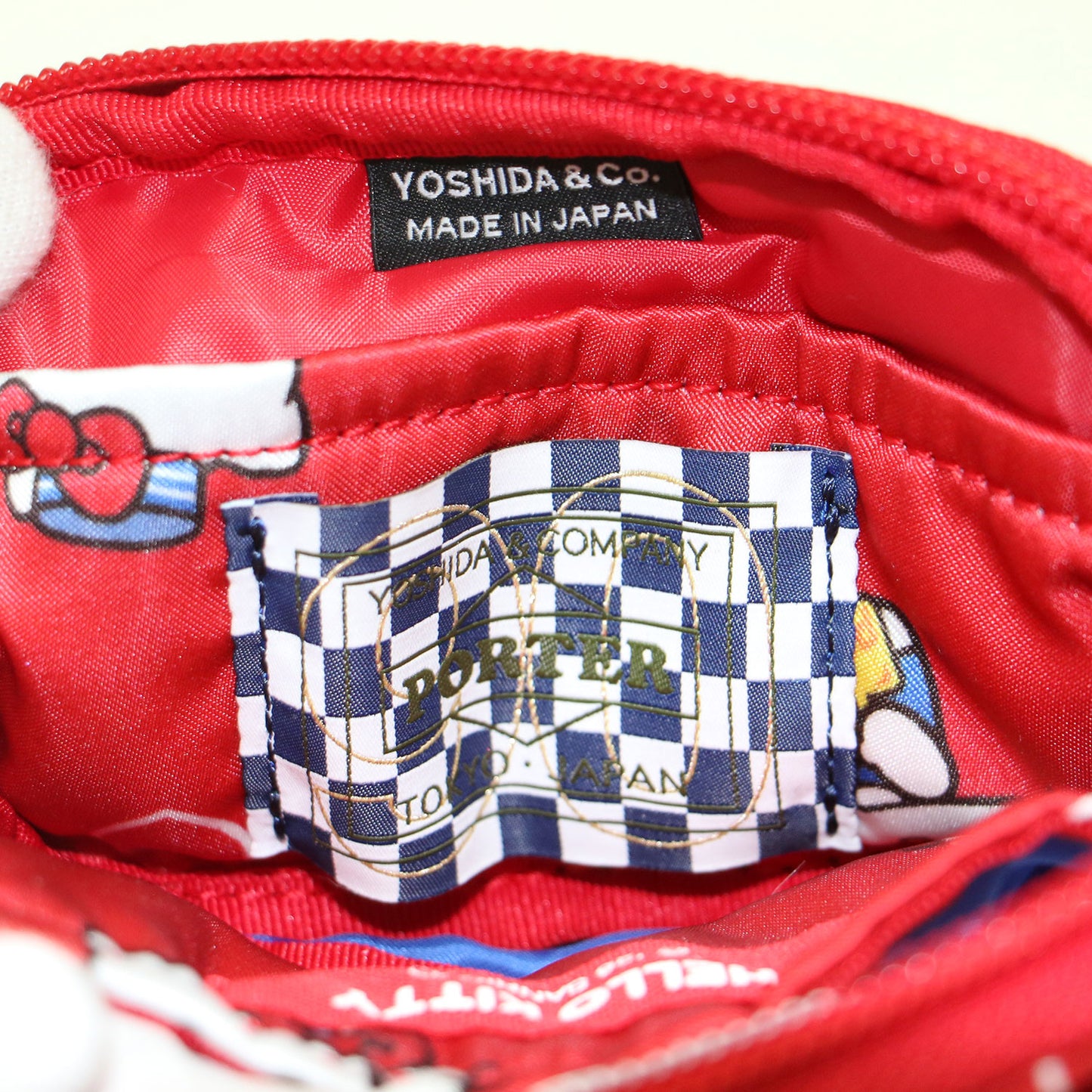 26春夏 HELLO KITTY MULTI POUCH 386-26907 / ハローキティ マルチ ポーチ リボンモチーフ プリント