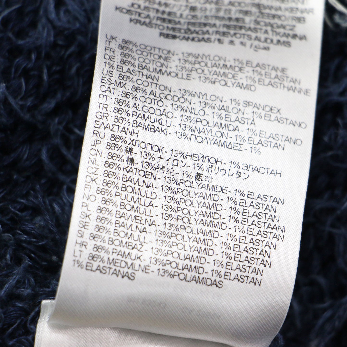 25春夏 ファーヤーン フード付き プルオーバー / Textured-knit hoodie ニット 長袖 インディゴ染 コットン
